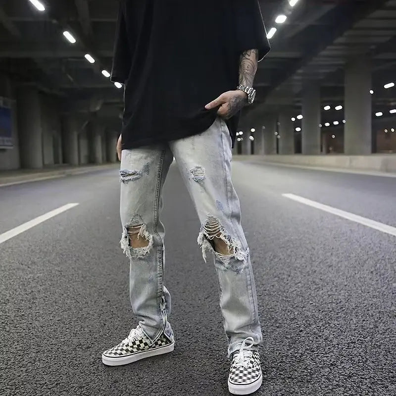 Light Wash Distressed Denim Jeans with Rips