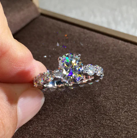 Moissanite Engagement Ring with Oval Cut and Diamonds
