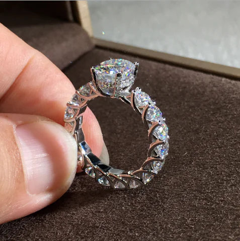 Moissanite Engagement Ring with Oval Cut and Diamonds