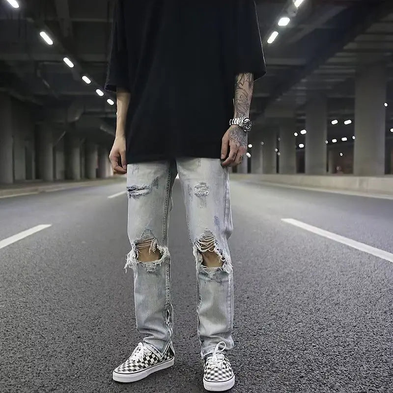 Light Wash Distressed Denim Jeans with Rips